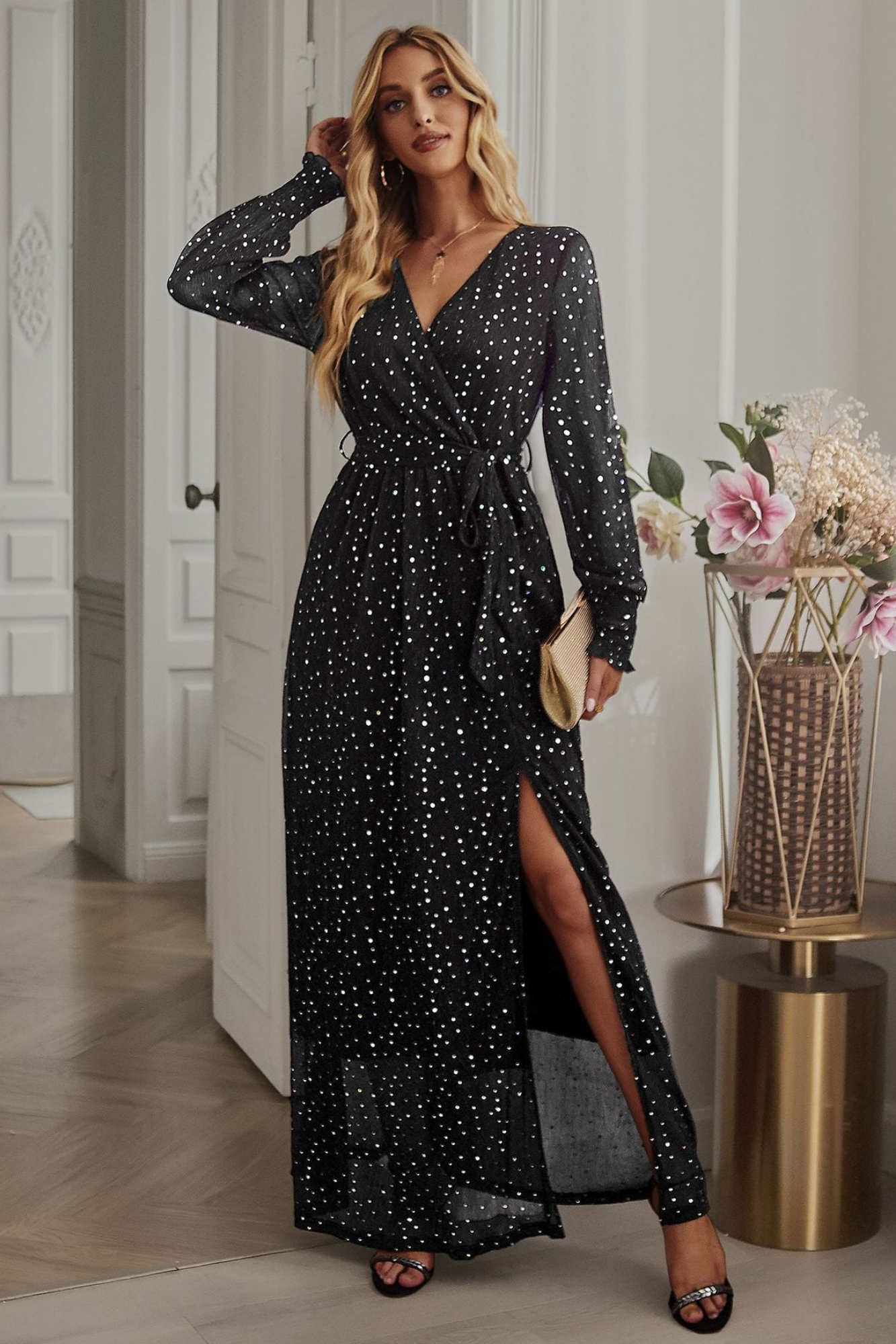 Side view of Black Long Sleeve Rhinestone Mesh Maxi Dress showcasing the side slit and elegant fit.