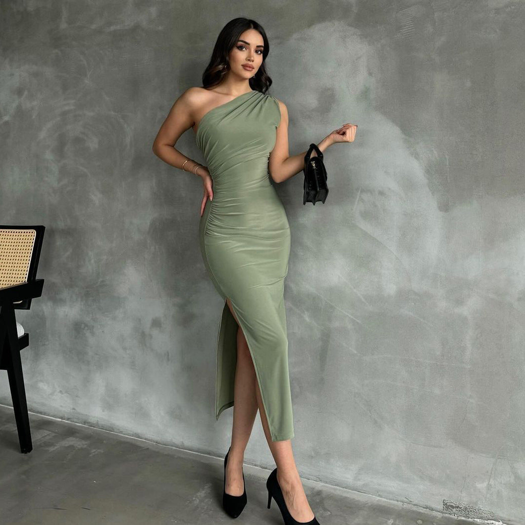 Side view of the Light Green Sleeveless One Shoulder Slit Stretch Midi Dress, highlighting the high slit and form-fitting silhouette.