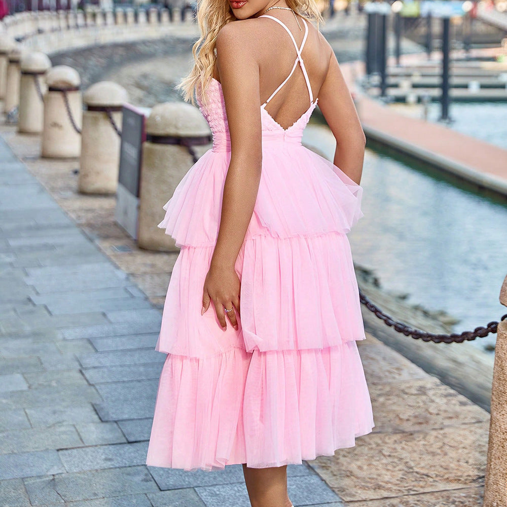 Back view of the Pink Mesh Spliced Suspender Tutu Dress highlighting its backless design and elegant mesh layers.