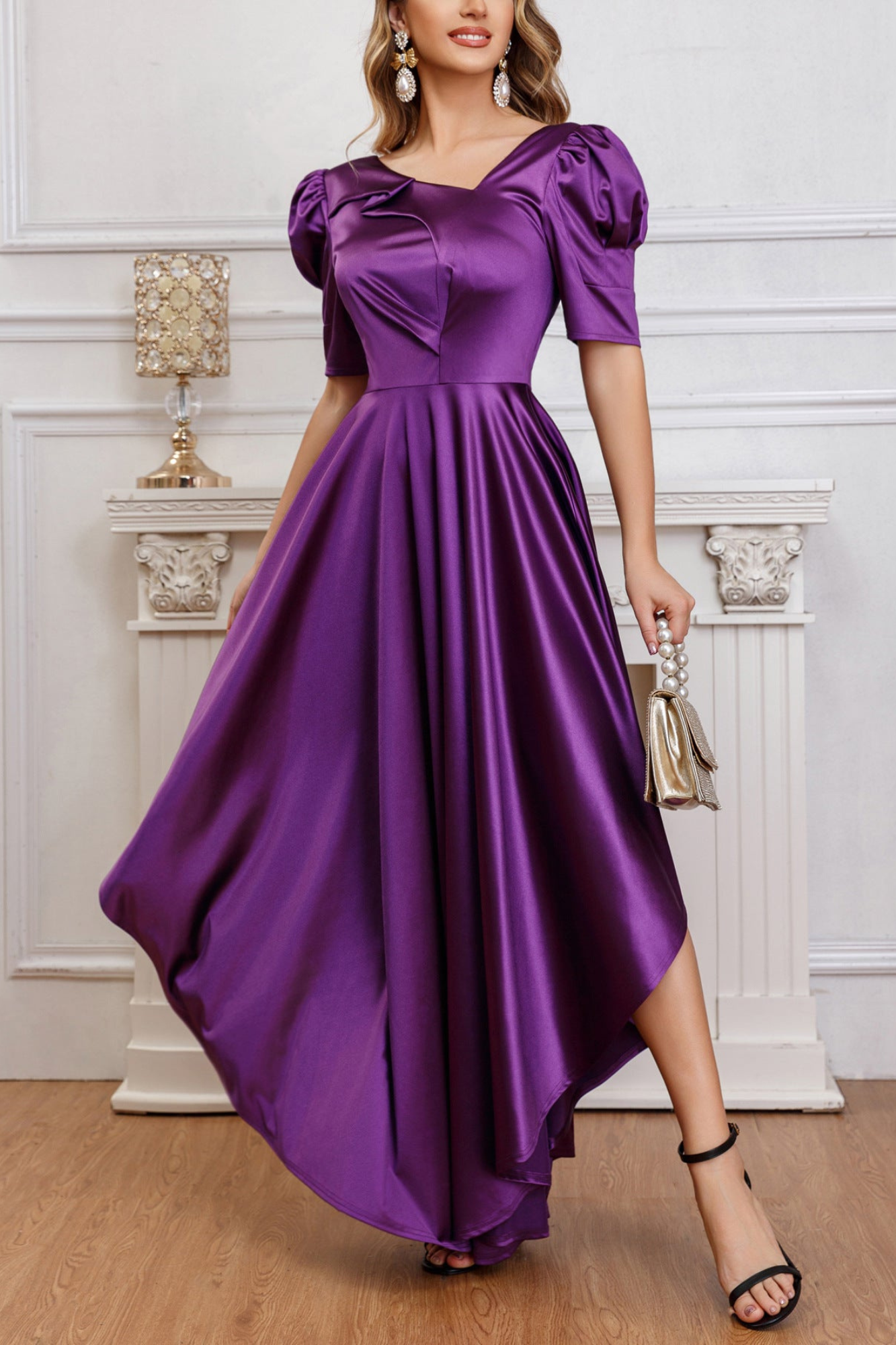 Front view of a purple puff sleeve satin pleated dress with an elegant high-low hem and pleated skirt.