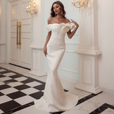 Off-Shoulder Mermaid Gown with Dramatic Ruffle Detail White