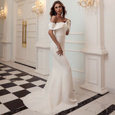 Off-Shoulder Mermaid Gown with Dramatic Ruffle Detail White