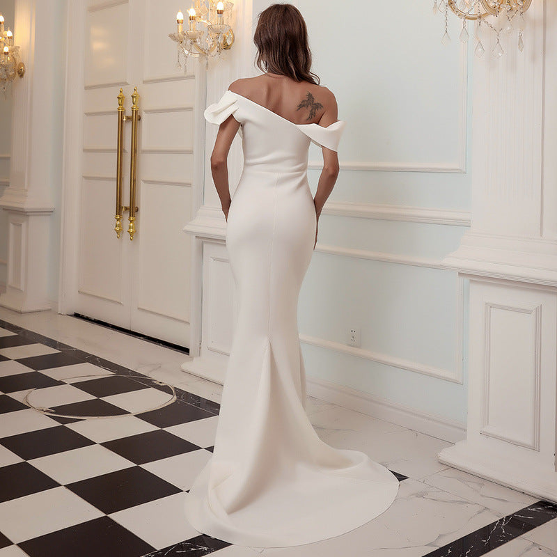 Off-Shoulder Mermaid Gown with Dramatic Ruffle Detail White