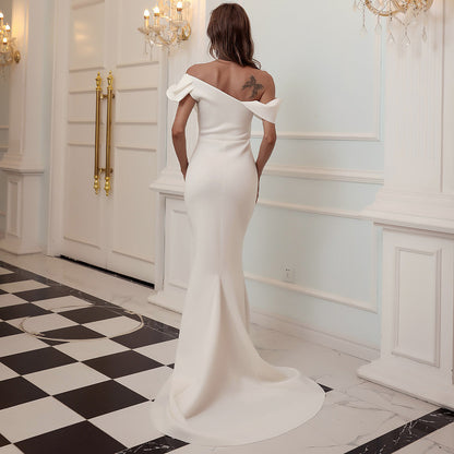Off-Shoulder Mermaid Gown with Dramatic Ruffle Detail White