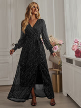 Close-up detail view of Black Long Sleeve Rhinestone Mesh Maxi Dress highlighting rhinestone embellishments and mesh fabric.