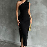 Close-up detail view of the Black Sleeveless One Shoulder Slit Stretch Midi Dress, focusing on the stretch fabric and design details.