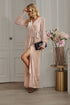 Side view of Champagne Long Sleeve Rhinestone Mesh Maxi Dress showcasing the side slit and elegant fit.