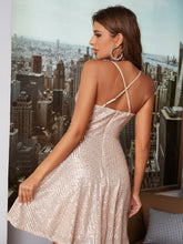 Back view of Champagne Pleated Sequined Cross Suspender Midi Dress featuring a backless design with cross suspender straps.