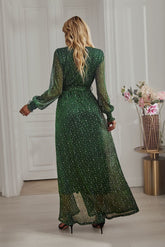 Back view of Green Long Sleeve Rhinestone Mesh Maxi Dress with long sleeves and a flowing maxi-length design.