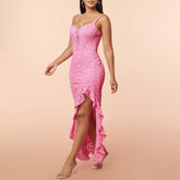 A close-up view of the embroidered lace details on the pink lace dress. The fine craftsmanship of the embroidery is highlighted, showing the delicate floral patterns that make the dress stand out. This image emphasizes the high-quality lace and intricate design, which adds sophistication and charm to the dress.

