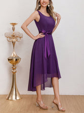 Side view of the Purple Chiffon Lace Spliced Evening Dress highlighting the flowing chiffon fabric, sleeveless cut, and high-low hem for added sophistication.