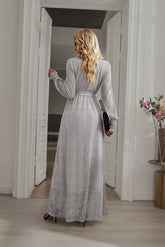 Back view of Silver Long Sleeve Rhinestone Mesh Maxi Dress with long sleeves and a flowing maxi-length design.