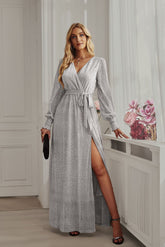 Front view of Silver Long Sleeve Rhinestone Mesh Maxi Dress with waistband and shimmering rhinestone details.